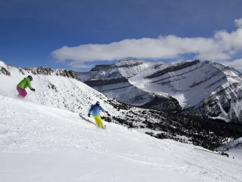 Two skiers at Lake Louise Ski Resort, Alberta