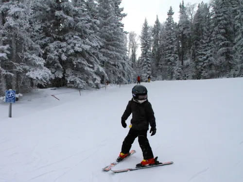 Skiing kid