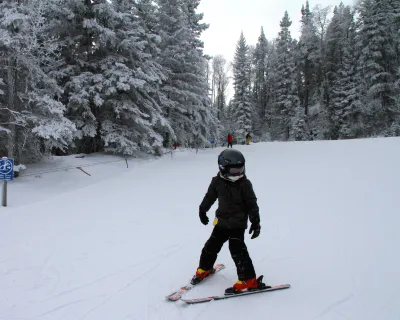 Skiing kid