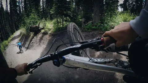 Airing off a roller at Silverstar Mountain Resort, BC.