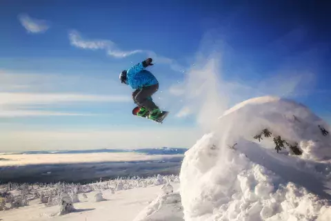 Dax Justin Big White snowboarder jump, BC