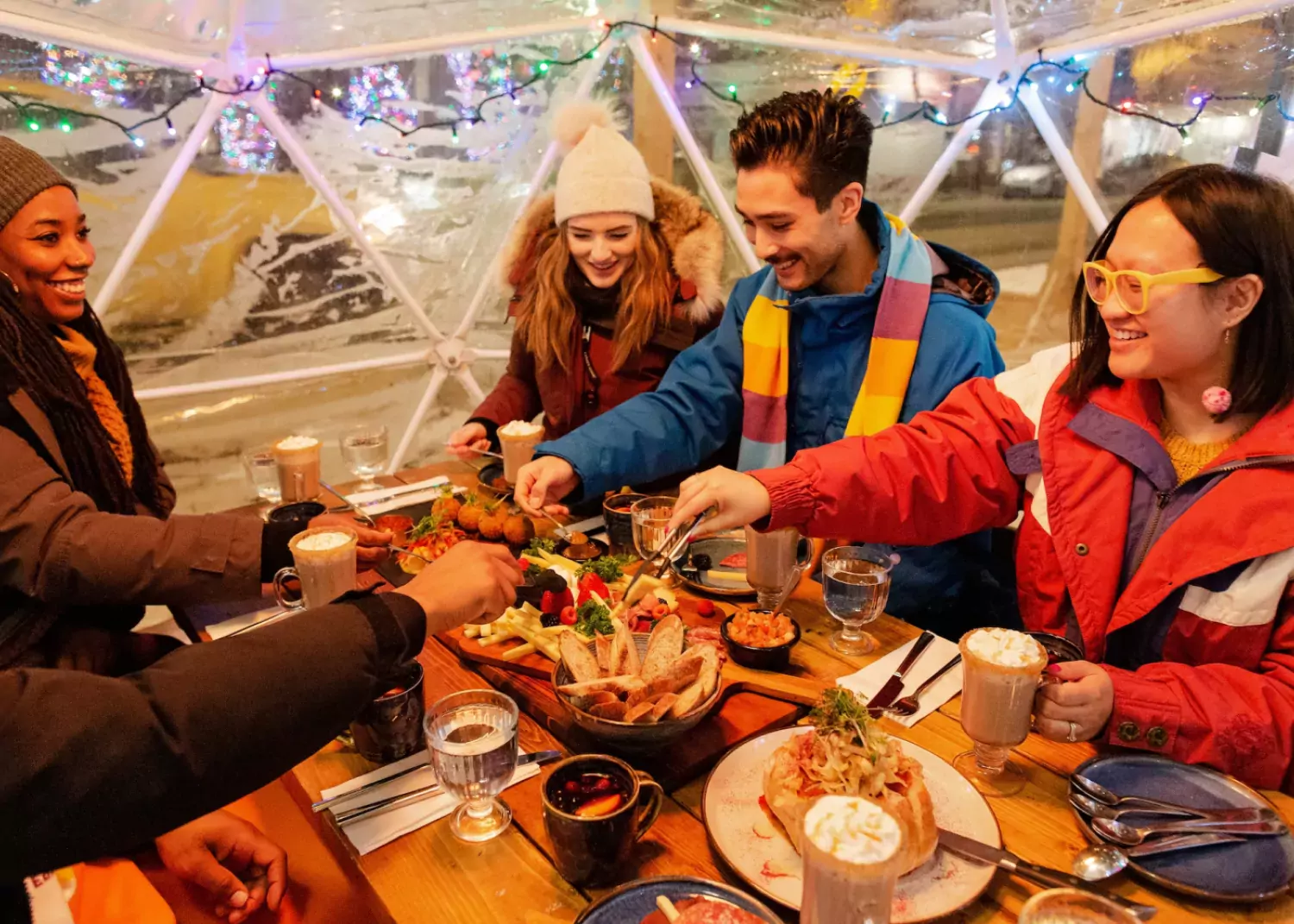 Heated igloos make the season bright, and warm. photo: Dallas Curow Tiramisu Bistro heated igloo winter patio Dallas Curow