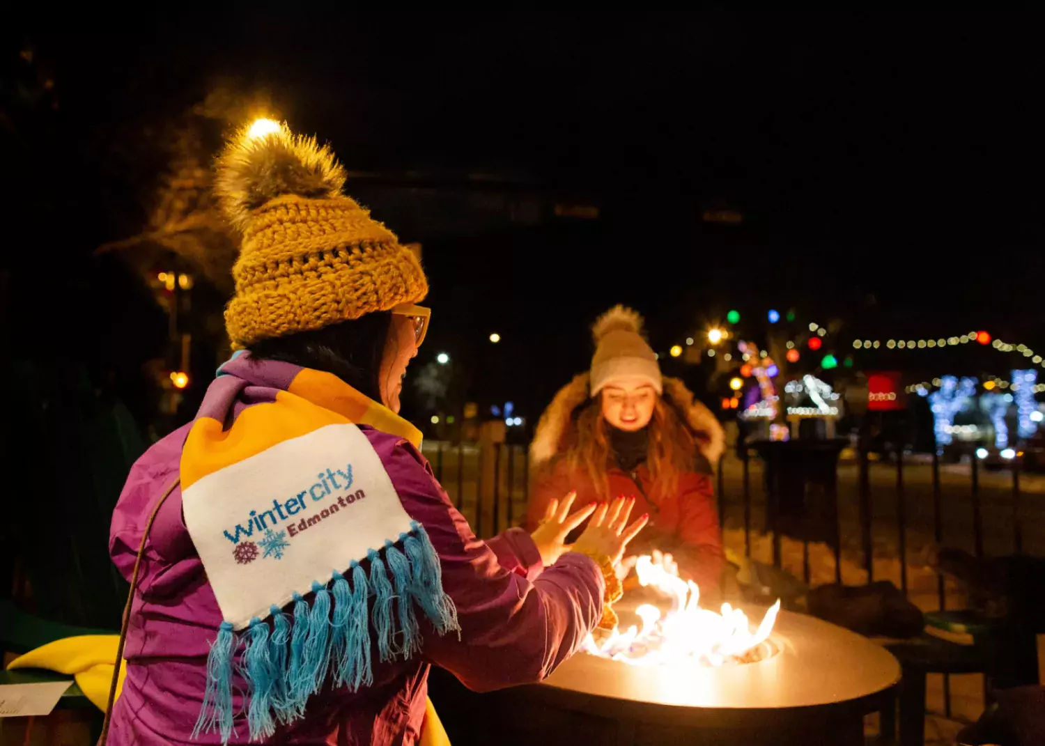 Cozy fireside visits with friends on a winter night are the best. photo: Dallas Curow The Next Act firepit on winter patio Dallas Curow